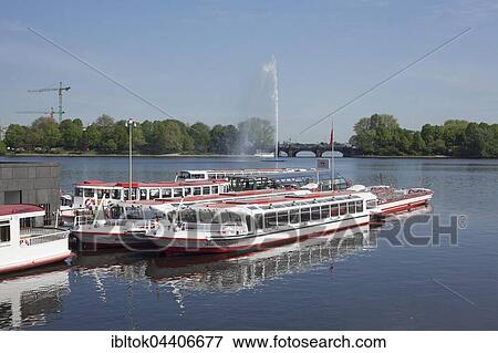 Inner Alster Lake with fountain and Lombardsbrücke, Jungfernstieg, Hamburg, Germany, Europe View Large Photo Image Stock Photo - Inner Alster Lake with fountain and Lombardsbrücke, Jungfernstieg, Hamburg, Germany, Europe. Fotosearch