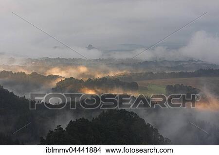 Interesting light, fog and cloud over Saxon Switzerland National Park, Saxony, Germany, Europe View Large Photo Image Picture - Interesting light, fog and cloud over Saxon Switzerland National Park, Saxony, Germany, Europe. Fotosearch