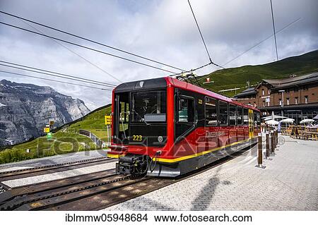 Jungfrau Railway to the Jungfraujoch, cog railway, behind mountains, Jungfrau region, Bernese Oberland, Switzerland, Europe View Large Photo Image Picture - Jungfrau Railway to the Jungfraujoch, cog railway, behind mountains, Jungfrau region, Bernese Oberland, Switzerland, Europe. Fotosearch