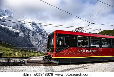 Stock Photo - Jungfrau Railway to the Jungfraujoch, cog railway, behind mountains, Jungfrau region, Bernese Oberland, Switzerland, Europe. Fotosearch
