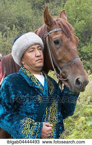 Kazakh man with his horse, Kazakh ethnographic village aul Gunny, Talgar, Almaty, Kazakhstan, Central Asia, For editorial Use only, Asia View Large Photo Image Stock Image - Kazakh man with his horse, Kazakh ethnographic village aul Gunny, Talgar, Almaty, Kazakhstan, Central Asia, For editorial Use only, Asia. Fotosearch