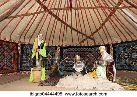 Kazakh women beating and spinning wool, Kazakh ethnographic village aul Gunny, Talgar city, Almaty, Kazakhstan, Asia View Large Photo Image Stock Photography - Kazakh women beating and spinning wool, Kazakh ethnographic village aul Gunny, Talgar city, Almaty, Kazakhstan, Asia. Fotosearch