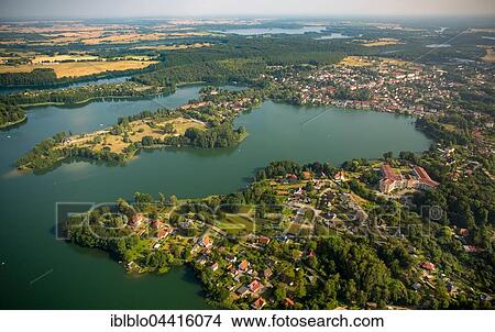Lake Feldberger Haussee with Feldberg, Feldberger Seenlandschaft, Mecklenburg Lake District, Mecklenburg-Western Pomerania, Germany, Europe View Large Photo Image Picture - Lake Feldberger Haussee with Feldberg, Feldberger Seenlandschaft, Mecklenburg Lake District, Mecklenburg-Western Pomerania, Germany, Europe. Fotosearch