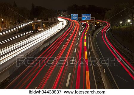 Light trails on motorway at night, Autobahn A 40, Essen, Ruhr district, North Rhine-Westphalia, Germany, Europe View Large Photo Image Stock Photo - Light trails on motorway at night, Autobahn A 40, Essen, Ruhr district, North Rhine-Westphalia, Germany, Europe. Fotosearch