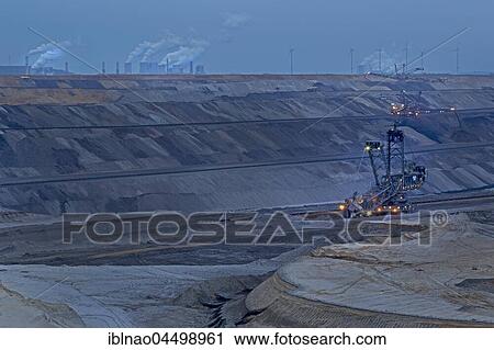 Lignite opencast mine at night, stacker, Garzweiler, North Rhine-Westphalia, Germany, Europe View Large Photo Image Stock Image - Lignite opencast mine at night, stacker, Garzweiler, North Rhine-Westphalia, Germany, Europe. Fotosearch