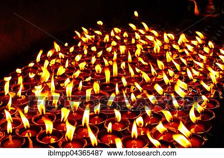 Lit oil lamps, monastery, Bodhnath, Kathmandu, Nepal, Asia View Large Photo Image Stock Photo - Lit oil lamps, monastery, Bodhnath, Kathmandu, Nepal, Asia. Fotosearch