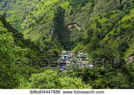 Little Village in green mountain landscape, Upper Marsyangdi valley, Jagat, Lamjung District, Nepal, Asia View Large Photo Image Stock Photograph - Little Village in green mountain landscape, Upper Marsyangdi valley, Jagat, Lamjung District, Nepal, Asia. Fotosearch