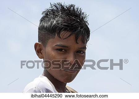 Stock Image - Local boy, Sinhalese, portrait, Beruwela, Western Province, Sri Lanka, Asia. Fotosearch