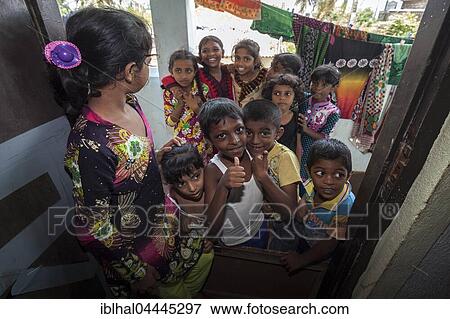 Local children in front of house door, Sinhalese, Beruwela, Western Province, Sri Lanka, Asia View Large Photo Image Stock Photo - Local children in front of house door, Sinhalese, Beruwela, Western Province, Sri Lanka, Asia. Fotosearch