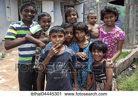 Local children standing outside house, Sinhalese, Beruwela, Western Province, Sri Lanka, Asia View Large Photo Image Stock Image - Local children standing outside house, Sinhalese, Beruwela, Western Province, Sri Lanka, Asia. Fotosearch