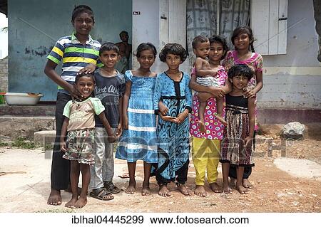 Local children standing outside house, Sinhalese, Beruwela, Western Province, Sri Lanka, Asia View Large Photo Image Stock Photo - Local children standing outside house, Sinhalese, Beruwela, Western Province, Sri Lanka, Asia. Fotosearch