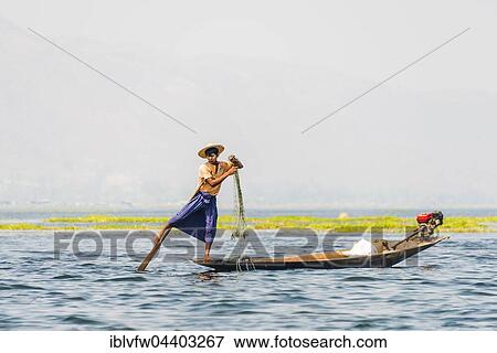 Local fishermen leg rowing on wooden boat, Inle Lake, Shan State, Myanmar, Asia View Large Photo Image Stock Photo - Local fishermen leg rowing on wooden boat, Inle Lake, Shan State, Myanmar, Asia. Fotosearch