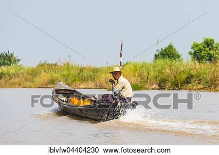 Local man steers motorboat, Inle Lake, Shan State, Myanmar, Asia View Large Photo Image Stock Image - Local man steers motorboat, Inle Lake, Shan State, Myanmar, Asia. Fotosearch