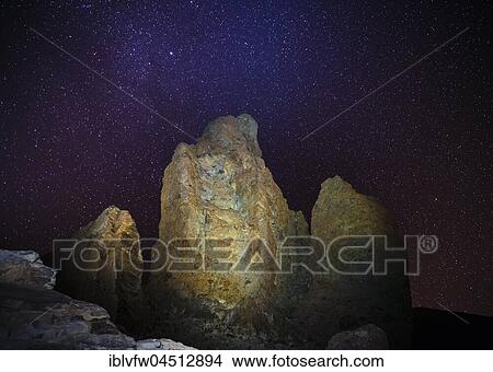 Picture - Los Roques de Garcia, Pico del Teide vulcano with night sky, night scene, Zapato de Reina, Las Cañadas, Teide vulcano National Park, Tenerife, Canary Islands, Spain, Europe. Fotosearch