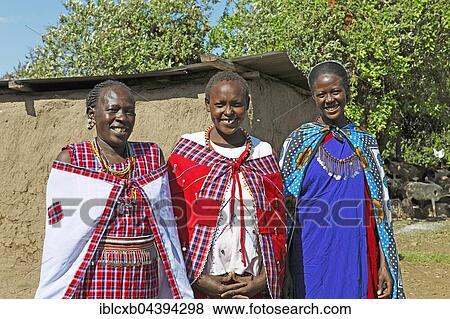 Maasai women in traditional shukas, Mara Triangle, Masai Mara, Narok County, Kenya, Africa View Large Photo Image Stock Photo - Maasai women in traditional shukas, Mara Triangle, Masai Mara, Narok County, Kenya, Africa. Fotosearch