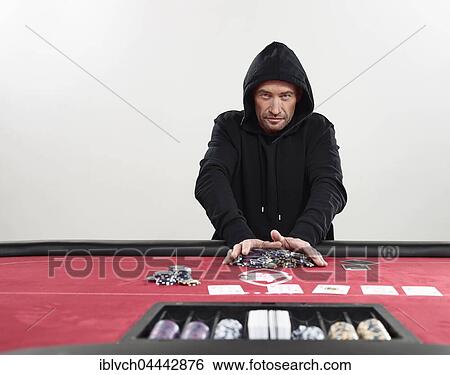 Man in hooded sweater going all-in, chips, blackjack, casino View Large Photo Image Stock Photograph - Man in hooded sweater going all-in, chips, blackjack, casino. Fotosearch