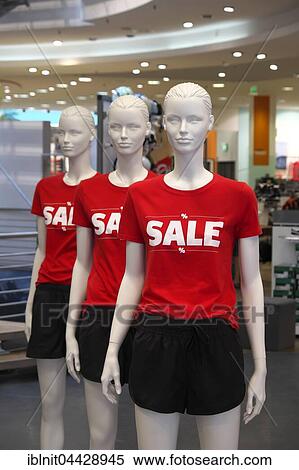 Mannequin with t-shirts displaying Sale View Large Photo Image Stock Photography - Mannequin with t-shirts displaying Sale. Fotosearch
