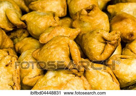 Many fresh samosas are piled up for sale, Bandipur, Tanahun District, Nepal, Asia View Large Photo Image Stock Image - Many fresh samosas are piled up for sale, Bandipur, Tanahun District, Nepal, Asia. Fotosearch