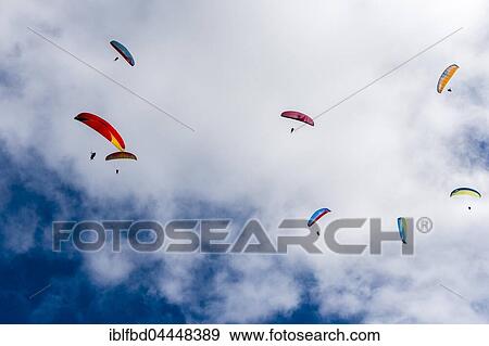 Many paragliders are flying in the air, over Pokhara and Phewa Lake, Sarangkot, Kaski District, Nepal, Asia View Large Photo Image Stock Photo - Many paragliders are flying in the air, over Pokhara and Phewa Lake, Sarangkot, Kaski District, Nepal, Asia. Fotosearch