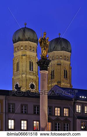 Stock Photo - Mariensäule, onion domes of the Church of Our Lady, dusk, Marienplatz, Munich, Bavaria, Germany, Europe. Fotosearch