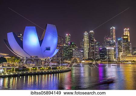 Marina Bay Sands Hotel, ArtScience Museum and skyline at night, Financial District, Banking District, Marina Bay, Downtown Core, Singapore, Asia View Large Photo Image Stock Photo - Marina Bay Sands Hotel, ArtScience Museum and skyline at night, Financial District, Banking District, Marina Bay, Downtown Core, Singapore, Asia. Fotosearch