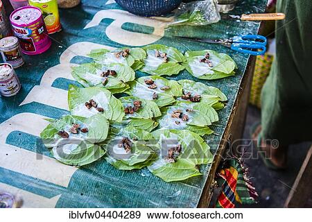 Market stall showing preparation of traditional chewing tobacco and betel nut, Nampan, Inle Lake, Shan State, Myanmar, Asia View Large Photo Image Stock Photo - Market stall showing preparation of traditional chewing tobacco and betel nut, Nampan, Inle Lake, Shan State, Myanmar, Asia. Fotosearch