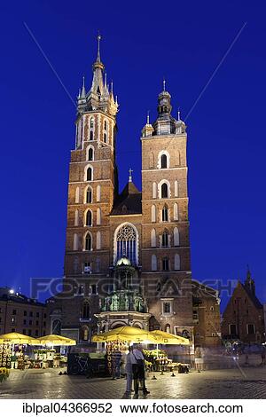 Stock Image - Marketplace Rynek Główny with Marienkirche, Twilight, Kraków, Poland, Europe. Fotosearch