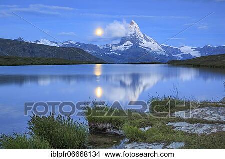 Picture - Matterhorn and mountain lake, Valais, Switzerland, Europe. Fotosearch