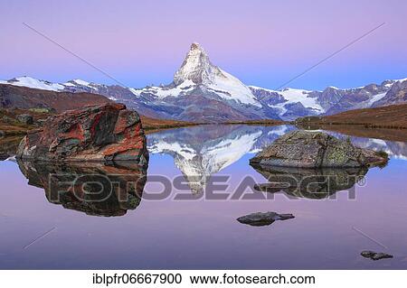 Stock Image - Matterhorn and mountain lake, Valais, Switzerland, Europe. Fotosearch
