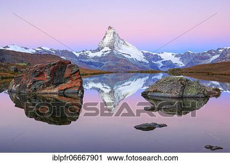 Matterhorn and mountain lake, Valais, Switzerland, Europe View Large Photo Image Stock Image - Matterhorn and mountain lake, Valais, Switzerland, Europe. Fotosearch