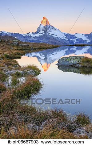 Stock Image - Matterhorn and mountain lake, Valais, Switzerland, Europe. Fotosearch