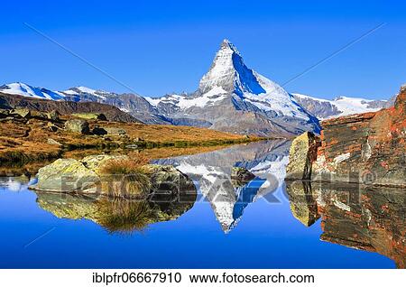 Matterhorn and mountain lake, Valais, Switzerland, Europe View Large Photo Image Stock Image - Matterhorn and mountain lake, Valais, Switzerland, Europe. Fotosearch