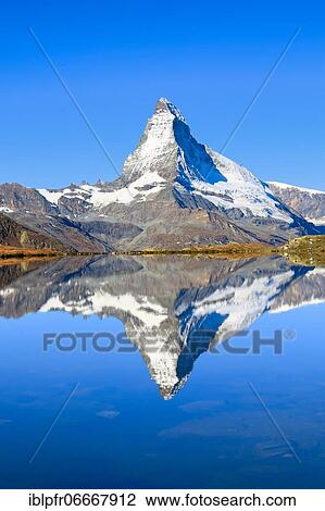 Matterhorn and mountain lake, Valais, Switzerland, Europe View Large Photo Image Stock Image - Matterhorn and mountain lake, Valais, Switzerland, Europe. Fotosearch