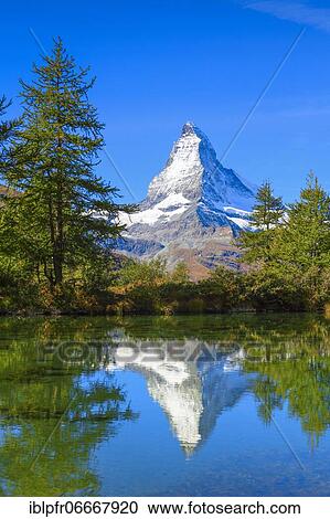 Matterhorn and mountain lake, Valais, Switzerland, Europe View Large Photo Image Stock Image - Matterhorn and mountain lake, Valais, Switzerland, Europe. Fotosearch