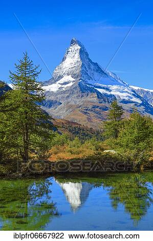 Matterhorn and mountain lake, Valais, Switzerland, Europe View Large Photo Image Stock Image - Matterhorn and mountain lake, Valais, Switzerland, Europe. Fotosearch