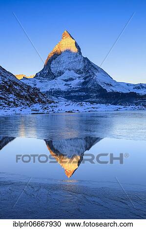 Matterhorn and mountain lake, Valais, Switzerland, Europe View Large Photo Image Stock Image - Matterhorn and mountain lake, Valais, Switzerland, Europe. Fotosearch