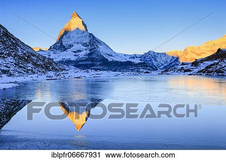 Stock Image - Matterhorn and mountain lake, Valais, Switzerland, Europe. Fotosearch