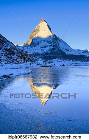 Stock Image - Matterhorn and mountain lake, Valais, Switzerland, Europe. Fotosearch