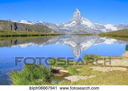 Matterhorn and mountain lake, Valais, Switzerland, Europe View Large Photo Image Stock Image - Matterhorn and mountain lake, Valais, Switzerland, Europe. Fotosearch