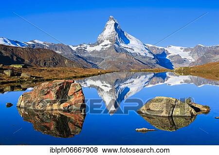 Stock Photo - Matterhorn and mountain lake, Valais, Switzerland, Europe. Fotosearch