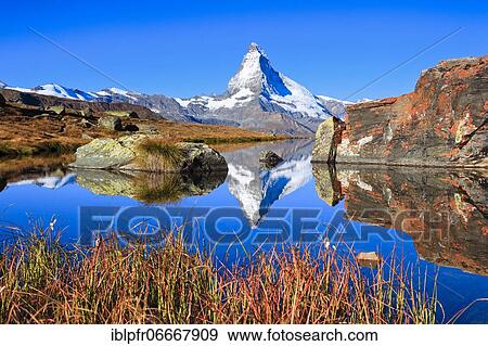 Matterhorn and mountain lake, Valais, Switzerland, Europe View Large Photo Image Stock Photo - Matterhorn and mountain lake, Valais, Switzerland, Europe. Fotosearch