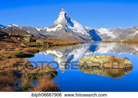 Stock Photograph - Matterhorn and mountain lake, Valais, Switzerland, Europe. Fotosearch