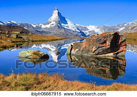 Matterhorn and mountain lake, Valais, Switzerland, Europe View Large Photo Image Stock Photography - Matterhorn and mountain lake, Valais, Switzerland, Europe. Fotosearch