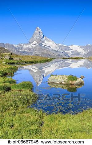 Matterhorn and mountain lake, Valais, Switzerland, Europe View Large Photo Image Stock Photography - Matterhorn and mountain lake, Valais, Switzerland, Europe. Fotosearch