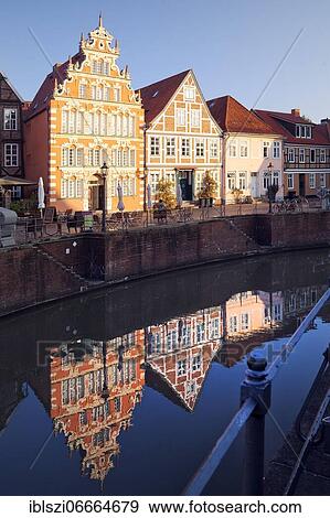 Stock Photo - Mayor Hintze House on the waterfront West with historic houses at the Hanseatic port, Old Town, Stade, Lower Saxony, Germany, Europe. Fotosearch