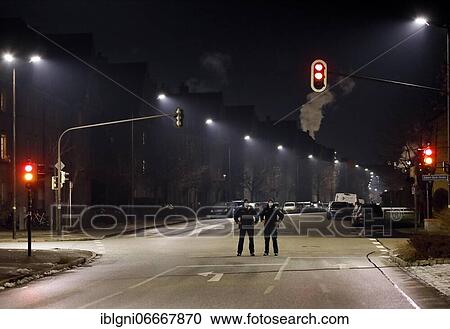 Stock Image - Measures against Corona pandemic, police officers control night curfew, Burghausen, Upper Bavaria, Bavaria, Germany, Europe. Fotosearch