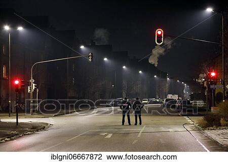 Stock Image - Measures against Corona pandemic, police officers control night curfew, Burghausen, Upper Bavaria, Bavaria, Germany, Europe. Fotosearch