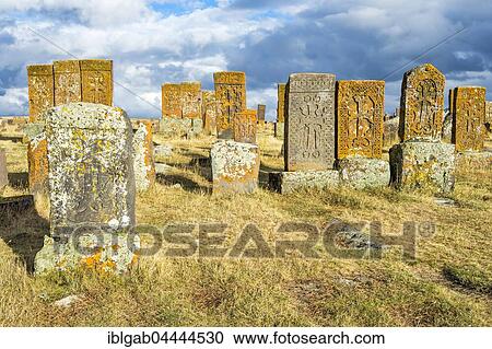 Stock Image - Medieval Khachkars, carved memorial stele, Noratus Cemetery, Lake Sevan, Gegharkunik Province, Armenia, Caucasus, Asia. Fotosearch