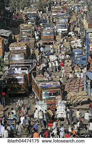 Merchants between trucks loaded with bags, Khari Baoli spice market, New Delhi, Delhi, India, Asia View Large Photo Image Stock Photography - Merchants between trucks loaded with bags, Khari Baoli spice market, New Delhi, Delhi, India, Asia. Fotosearch