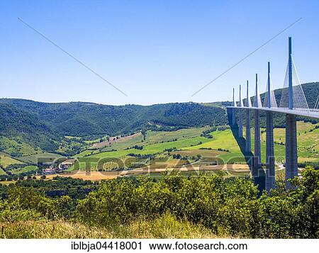 Millau Viaduct, A75 motorway, built by Michel Virlogeux and Norman Foster, located between Causses de Sauveterre and Causses du Larzac above Tarn River, Natural Regional Park of Grands Causses, Aveyron, France, Europe View Large Photo Image Stock Image - Millau Viaduct, A75 motorway, built by Michel Virlogeux and Norman Foster, located between Causses de Sauveterre and Causses du Larzac above Tarn River, Natural Regional Park of Grands Causses, Aveyron, France, Europe. Fotosearch